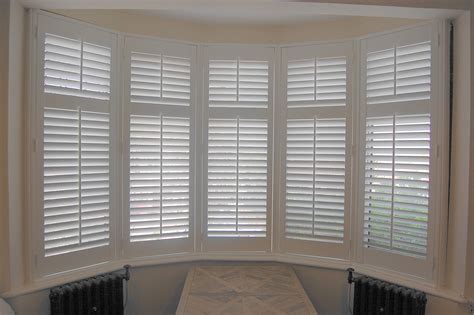 Bay window with full height shutters in 63mm slat size, silk white. | Bay window, House, Budget ...