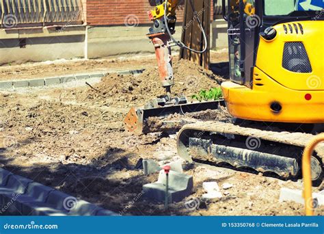 Yellow Bulldozer Moving the Earth in Public Work Stock Photo - Image of ...