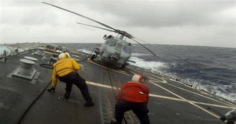 Video of unbelievable helicopter landing on ship deck in rough seas