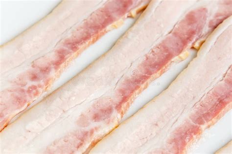 Raw Bacon strips slices stock photo. Image of appetizer - 47684454