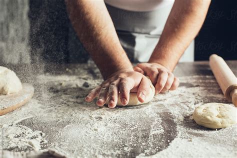 "Baker Kneading Dough" by Stocksy Contributor "Lumina" - Stocksy