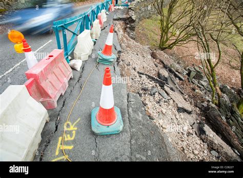 A road in the Langdale Valley collapsed due to extreme weather. Infrastructure damage is ...