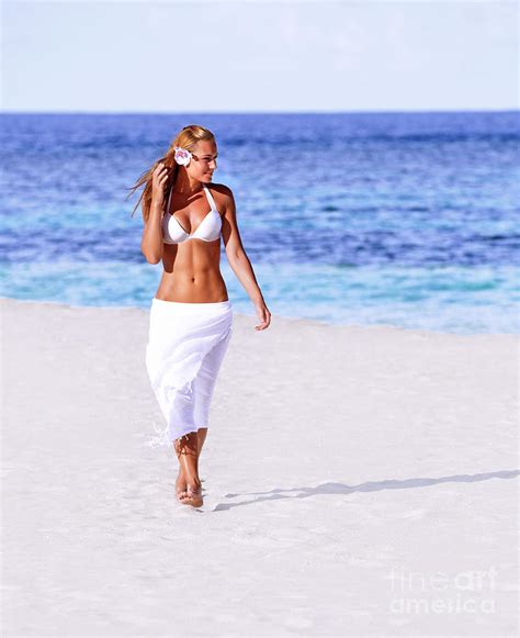 Hot girl walking on the beach Photograph by Anna Om