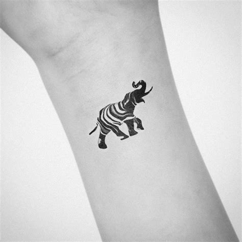 Simple Elephant Silhouette Tattoo | Inku Paw