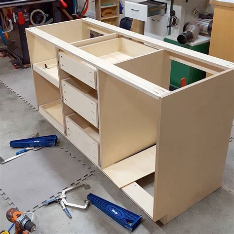 the cabinets are being built and ready to be installed in the shop or workshop area