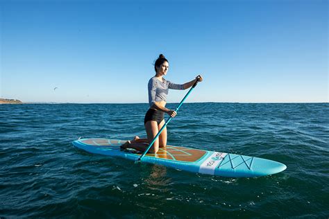 How to Stand on a Paddleboard | PRO TIPS by DICK'S Sporting Goods