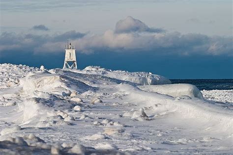 Grand Marais Harbor Light Winter by James Marvin Phelps | Winter photography, Grand marais ...