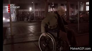 Old man falling on wheelchair on Make a GIF