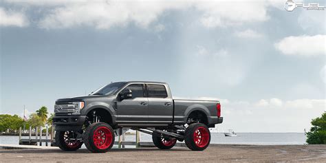 Get Super with this F-250 on Candy Red Fuel Wheels!