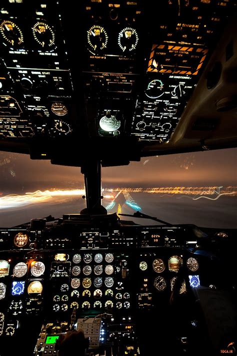 cockpit view of landing at night - Photorator