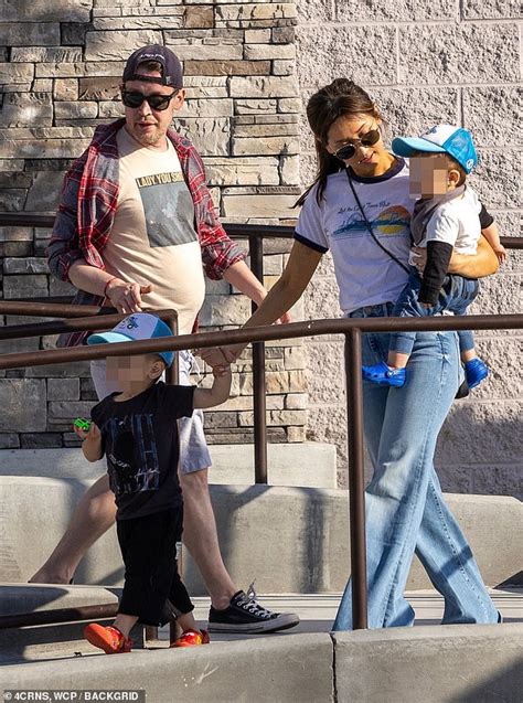 Macaulay Culkin enjoys a family outing with fiancée Brenda Song and ...