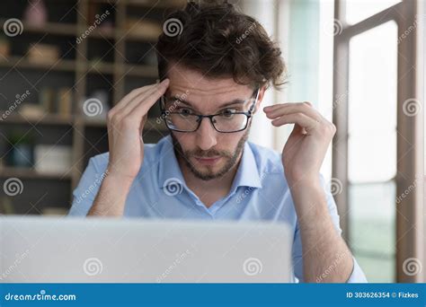 Man in Glasses Stare Wide-eyed at Laptop Screen Stock Photo - Image of ...