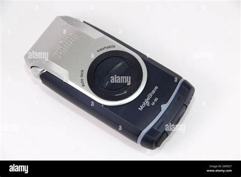 Braun battery operated electric travel shaver Stock Photo - Alamy