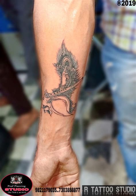 #Krishna Flute# with #Peacock feather # #shankha tattoo# done by #R ...