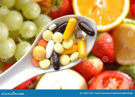 Pills spoon fruits stock photo. Image of vegetable, tablets - 10081748