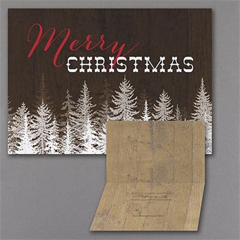 a christmas card with trees on it and a wooden board in the foreground ...