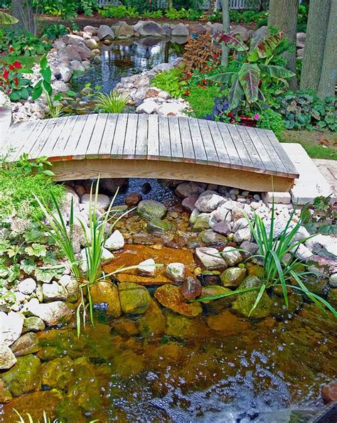 Backyard pond bridge | Waterfalls backyard, Ponds backyard, Pond landscaping