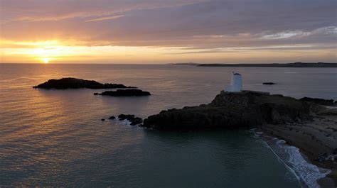 Twr Mawr Lighthouse sunset aerial footage