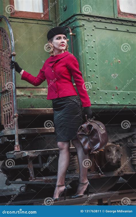 Woman on the train station stock image. Image of girl - 131763811