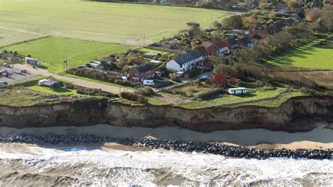 Coastal erosion: North Norfolk District Council could spend £100k on land - BBC News