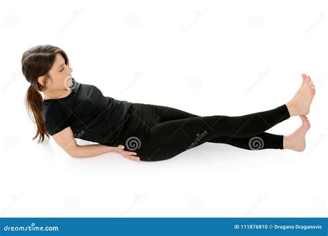 Young Woman Doing Yoga Lying on the Floor Stock Photo - Image of ...