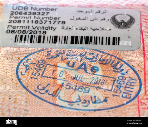 UAE border crossing stamp in an open passport. United Arab Emirates ...