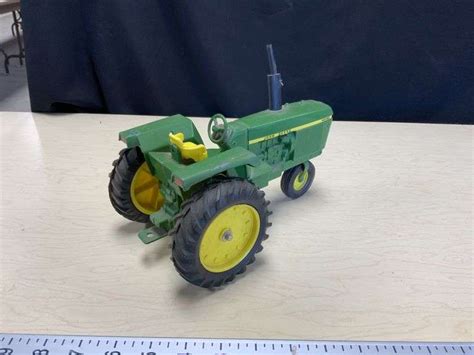 John Deere 4230 tractor - Legacy Auction Company