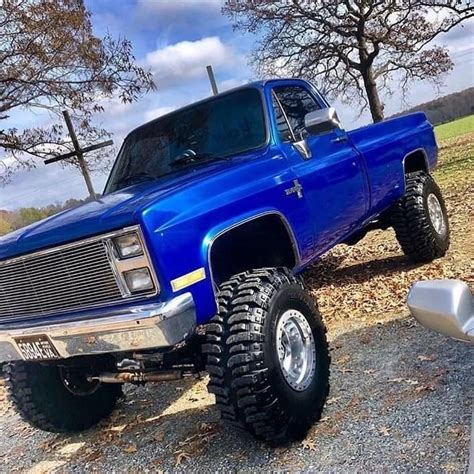 Electric Blue Lifted Chevy Truck