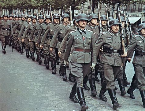 A column of German Wehrmacht parading down the Champs-Élysées, Paris, 1941 / Photograph by André ...