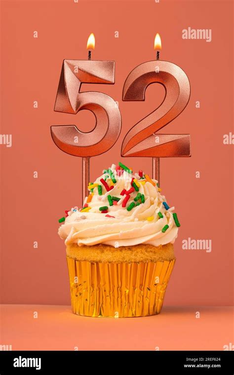 Candle number 52 - Cake birthday in coral fusion background Stock Photo ...