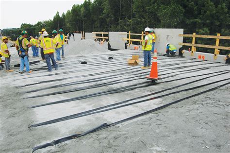 Instrumented MSE wall reinforced with polyester straps - Geosynthetics Magazine