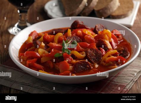 Traditional Hungarian Lecso with spiced sausage on a plate Stock Photo ...