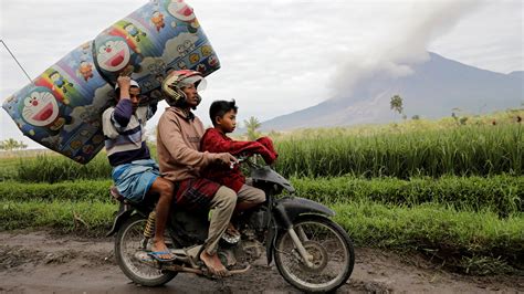 Photos From Indonesia Volcano: Death Toll Rises - The New York Times