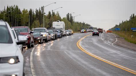 Canada wildfires force thousands to flee as state of emergency declared ...