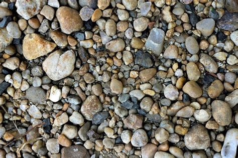 Premium Photo | Texture of stones and boulders of different sizes on ...