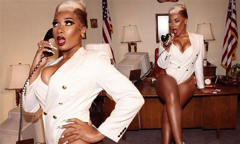 Megan Thee Stallion commands attention in white bodysuit blazer from EXPLICIT Thot S*** music video