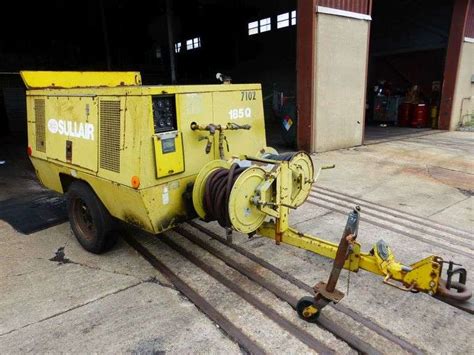 Sullair Tow Behind Air Compressor - Yellow Tag Auctions