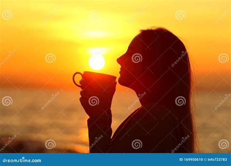 Woman Drinks Coffee at Sunrise on the Beach Stock Photo - Image of health, female: 169950610