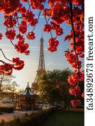 Free art print of Rare snowy day in Paris. The Eiffel Tower and decorated Christmas tree ...