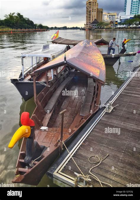 Traditional Malay river boats used for tourist cruises on the Sarawak River, Kuching, Sarawak ...