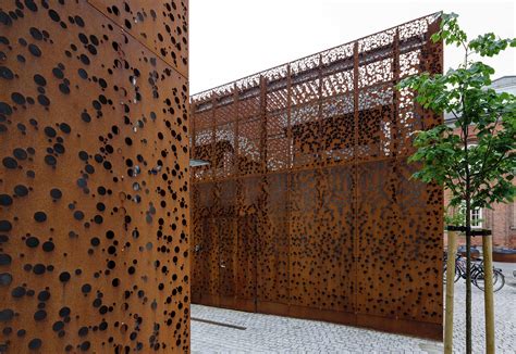 Perforated Corten panels as cladding, Municipal building in Danmarksgade - Aalborg by RMIG ...