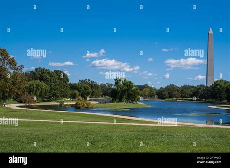 Washington, DC. National Mall, Constitution Gardens, Small Pond, with Washington Monument in ...