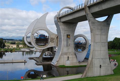 The Falkirk Wheel is a rotating boat lift in Scotland. It connects the Forth and Clyde Canal ...