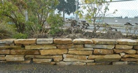 flagstone retaining wall | How To | Dry-stacked Flagstone Wall | Stone walls garden, Decorative ...