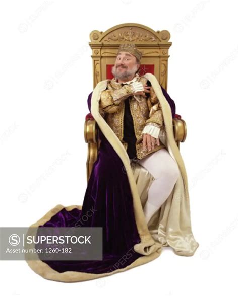 Portrait of a king sitting on a throne - SuperStock