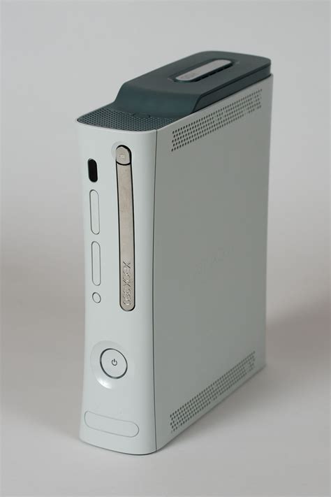 File:Xbox360 white HDMI 203W front vertical.jpg - Wikimedia Commons