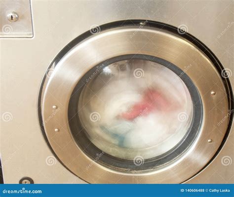 Rinse Cycle of Clothing at Laundromat Washer Stock Photo - Image of clothes, washer: 140606488