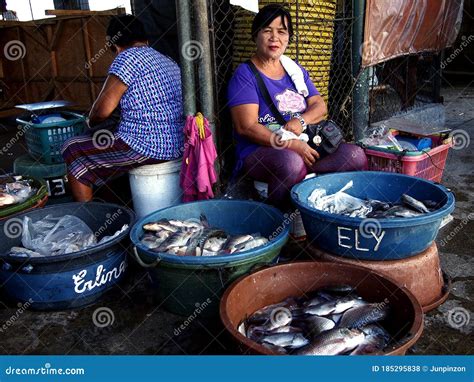 A Fish Vendor Sells Fresh Fishes at Fish Port and Public Market ...