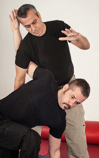 Kapap Instructor Demonstrates Standing Arm Lock Techniques Stock Photo ...