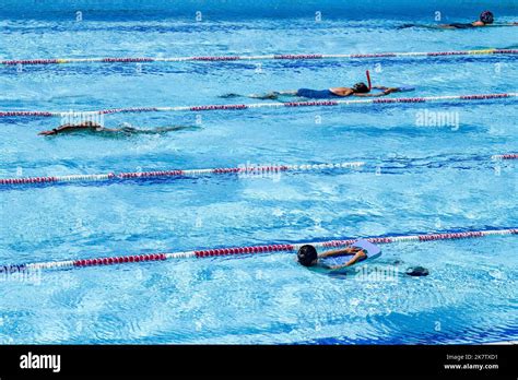 Swimming pool, aquatic center "Les Bains” in Dieppe (northern France). Swimmers in the outdoor ...